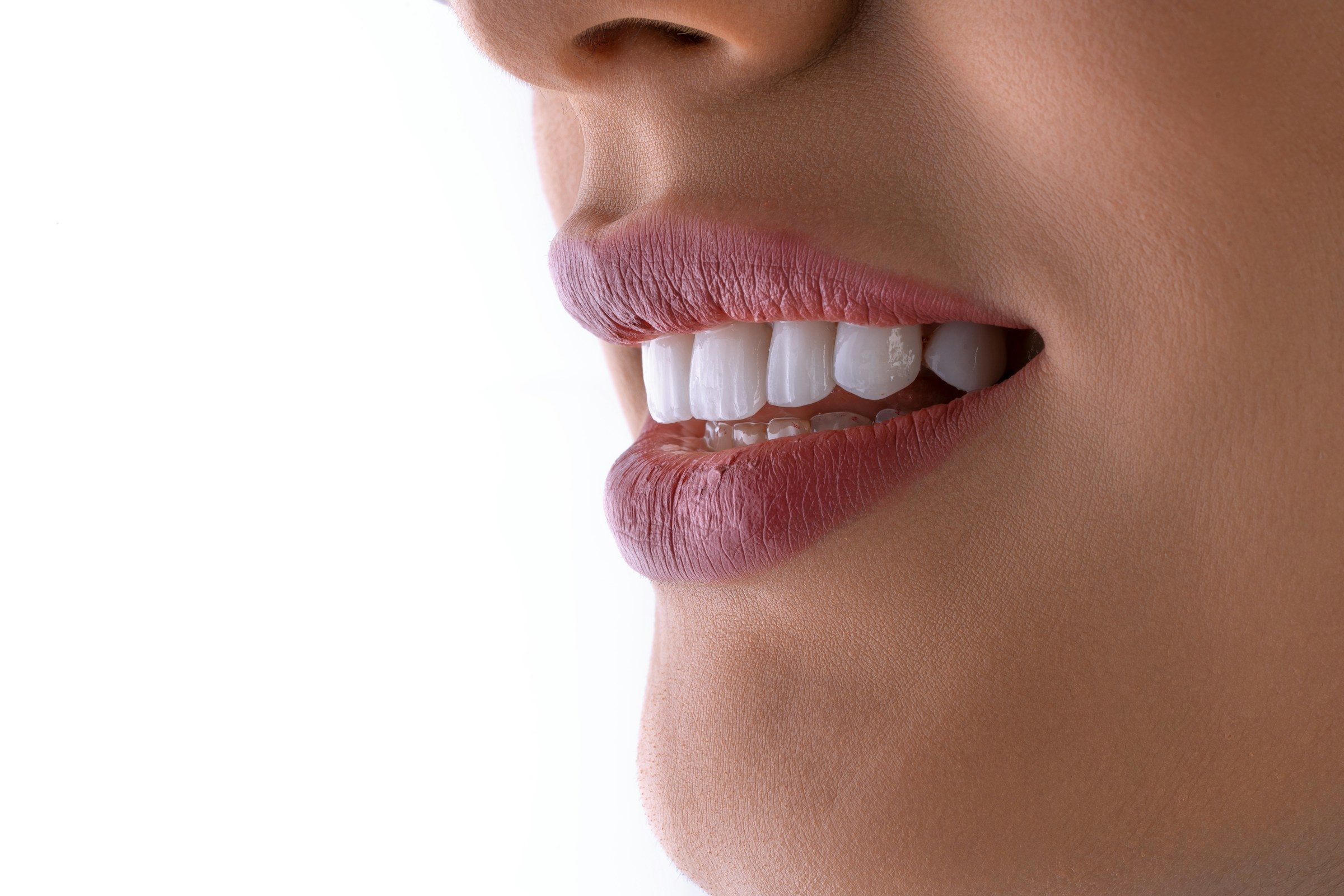 Close-up of a smile with bright, evenly-shaped teeth — the kind of result composite bonding can produce