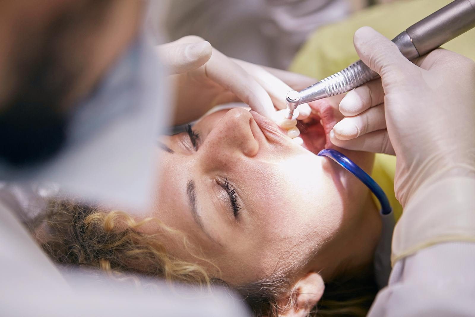 Patient lying back calmly during a professional dental hygiene appointment