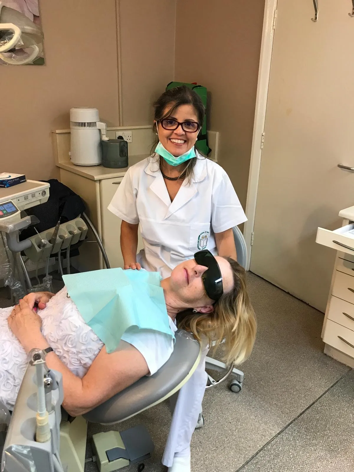 Dr Jacqueline Jacobs smiling beside a relaxed patient in the treatment chair at Campos Dental, Edgware.